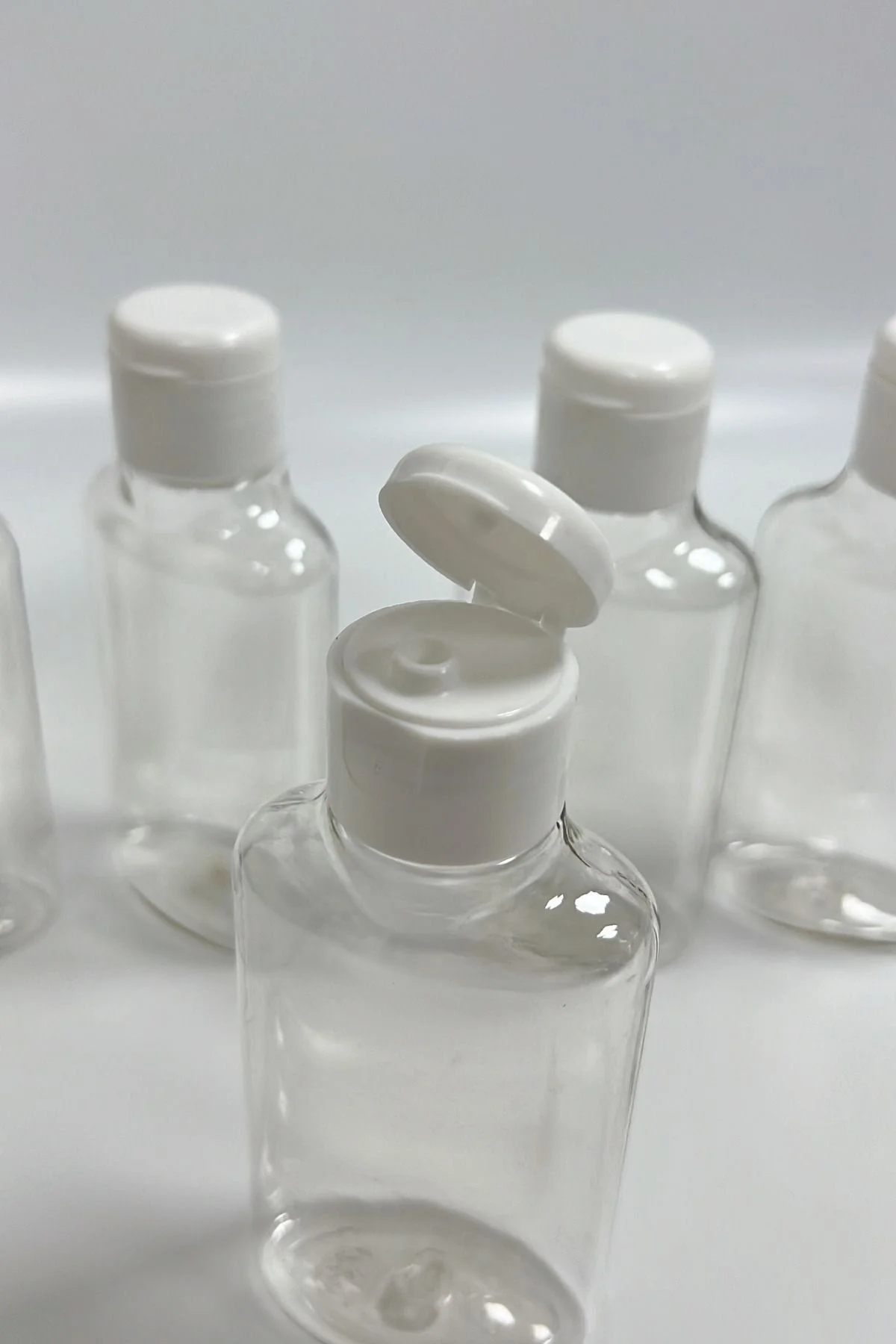 5'li Şeffaf 100ml Plastik Fliptop Kapaklı Şişe Seyahat Seti Boş Şişe