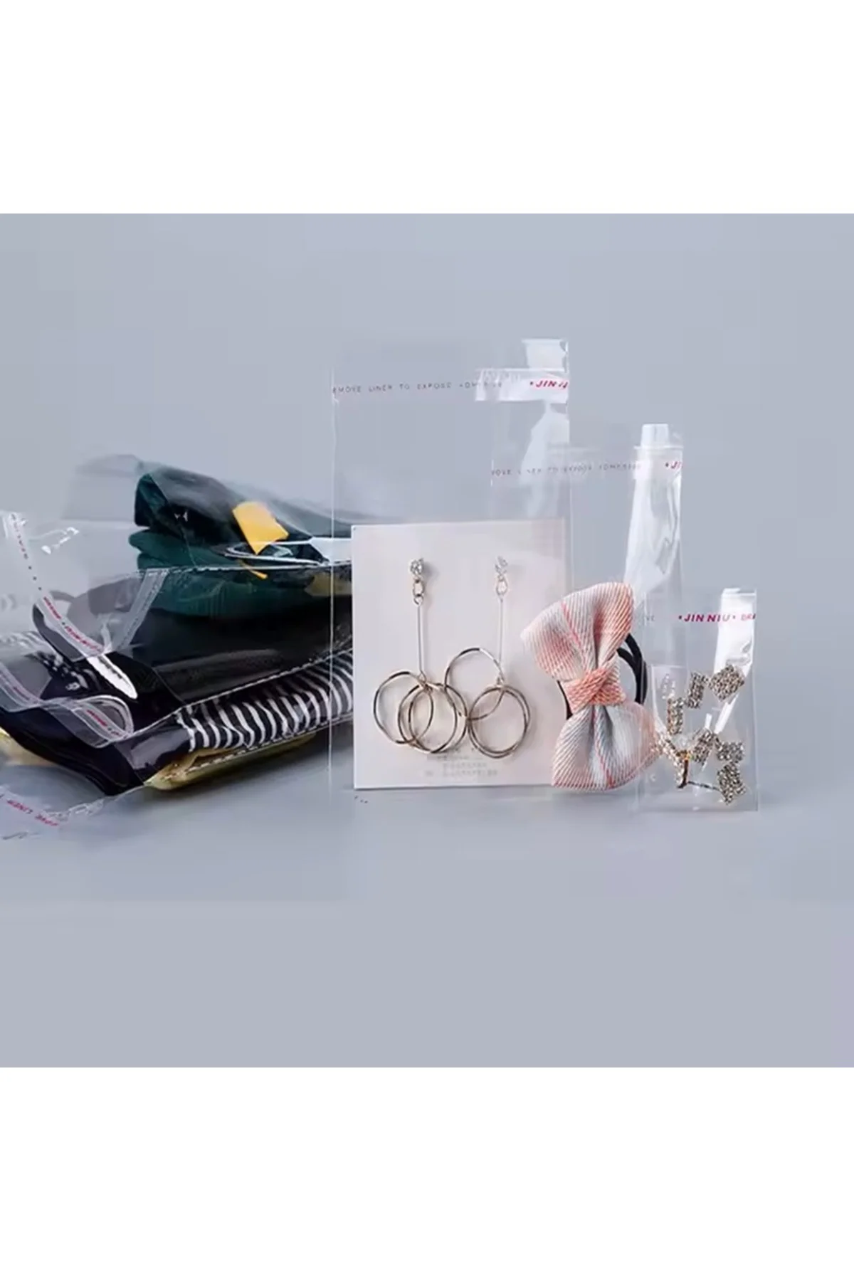 9x10+4 cm Bantlı Şeffaf Jelatin Torba - 100 Adet - Dayanıklı Yırt 9x10+4 cm Bantlı Şeffaf Jelatin Torba - 100 Adet - Dayanıklı Yırt