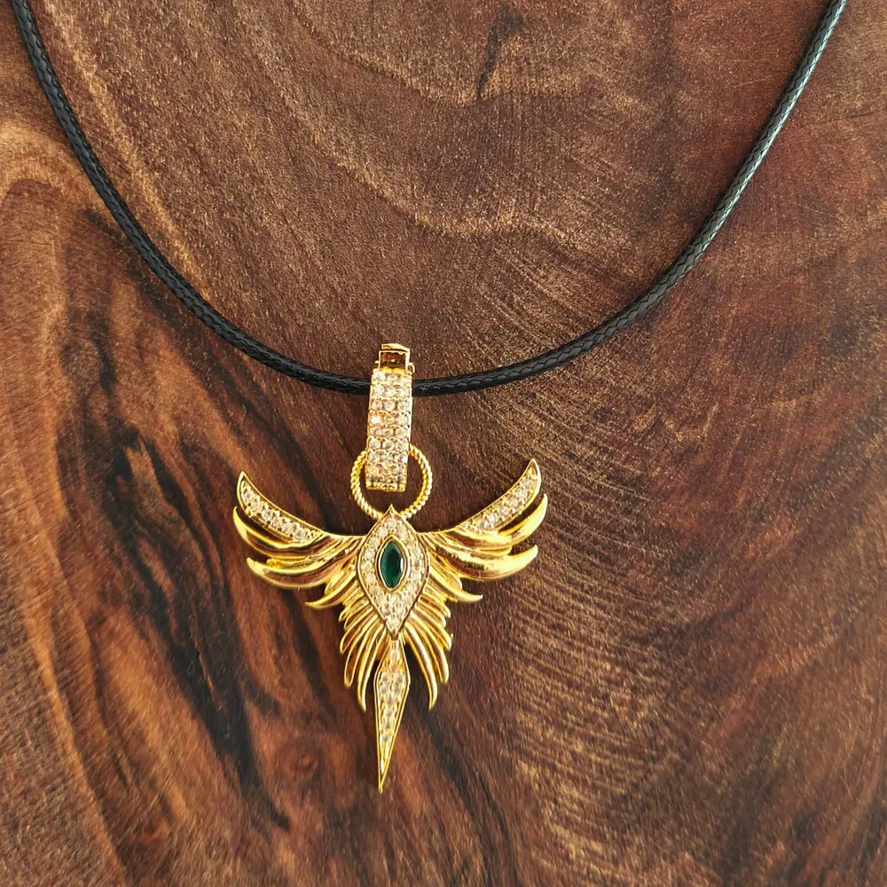 Anka Kuşu Yeşil Taşlı Gold Çelik Kadın Kolye Anka Kuşu Yeşil Taşlı Gold Çelik Kadın Kolye