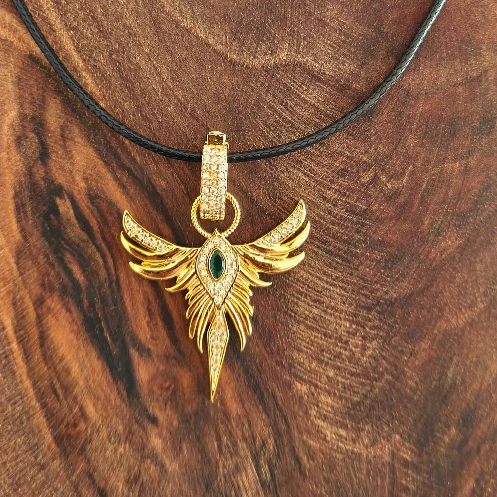 Anka Kuşu Yeşil Taşlı Gold Çelik Kadın Kolye Anka Kuşu Yeşil Taşlı Gold Çelik Kadın Kolye