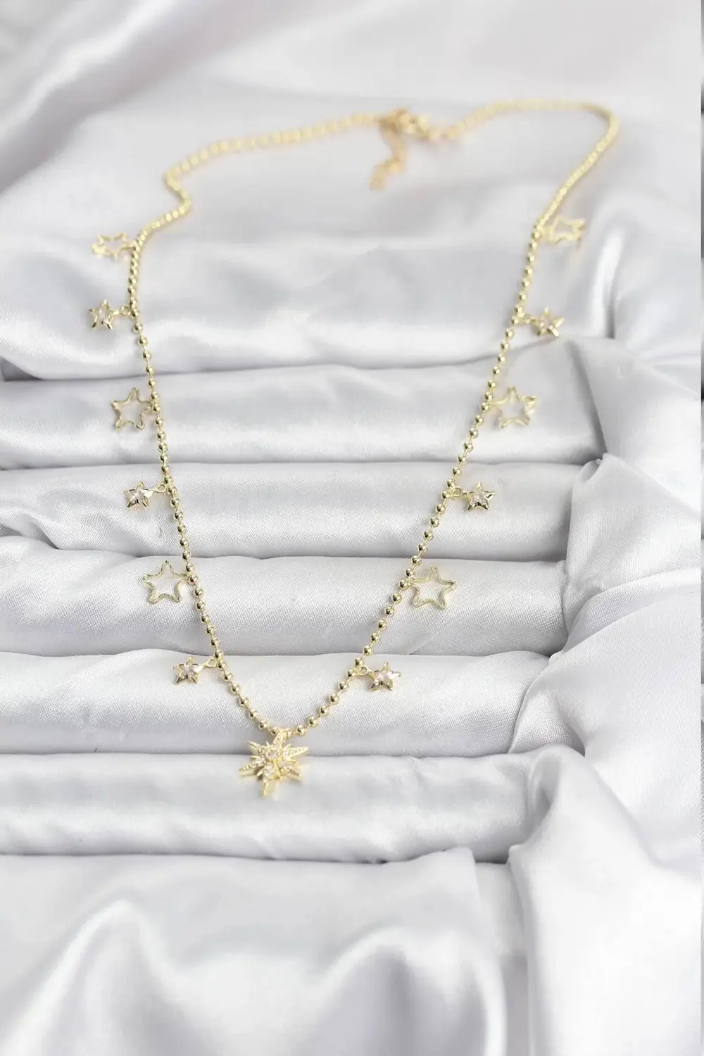 BFS Pirinç Gold Renk Zirkon Taşlı Kutup Yıldızı Model Kadın Kolye