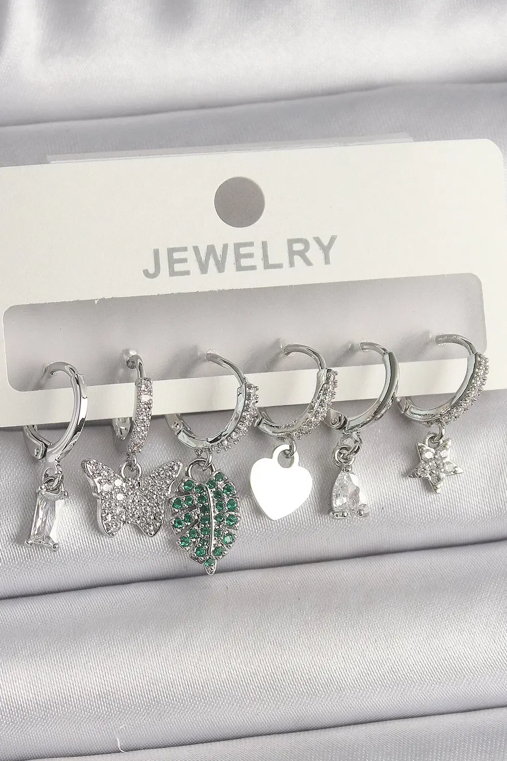 BFS Pirinç Gümüş Renk Zirkon Taşlı Çoklu Figür Kadın Küpe Seti