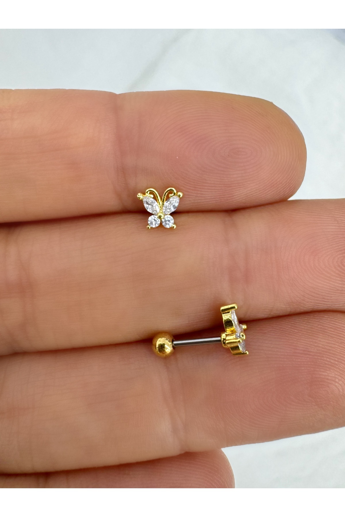 Çelik barlı zirkon taşlı 1 adet kelebek tragus helix lobe uyumlu 