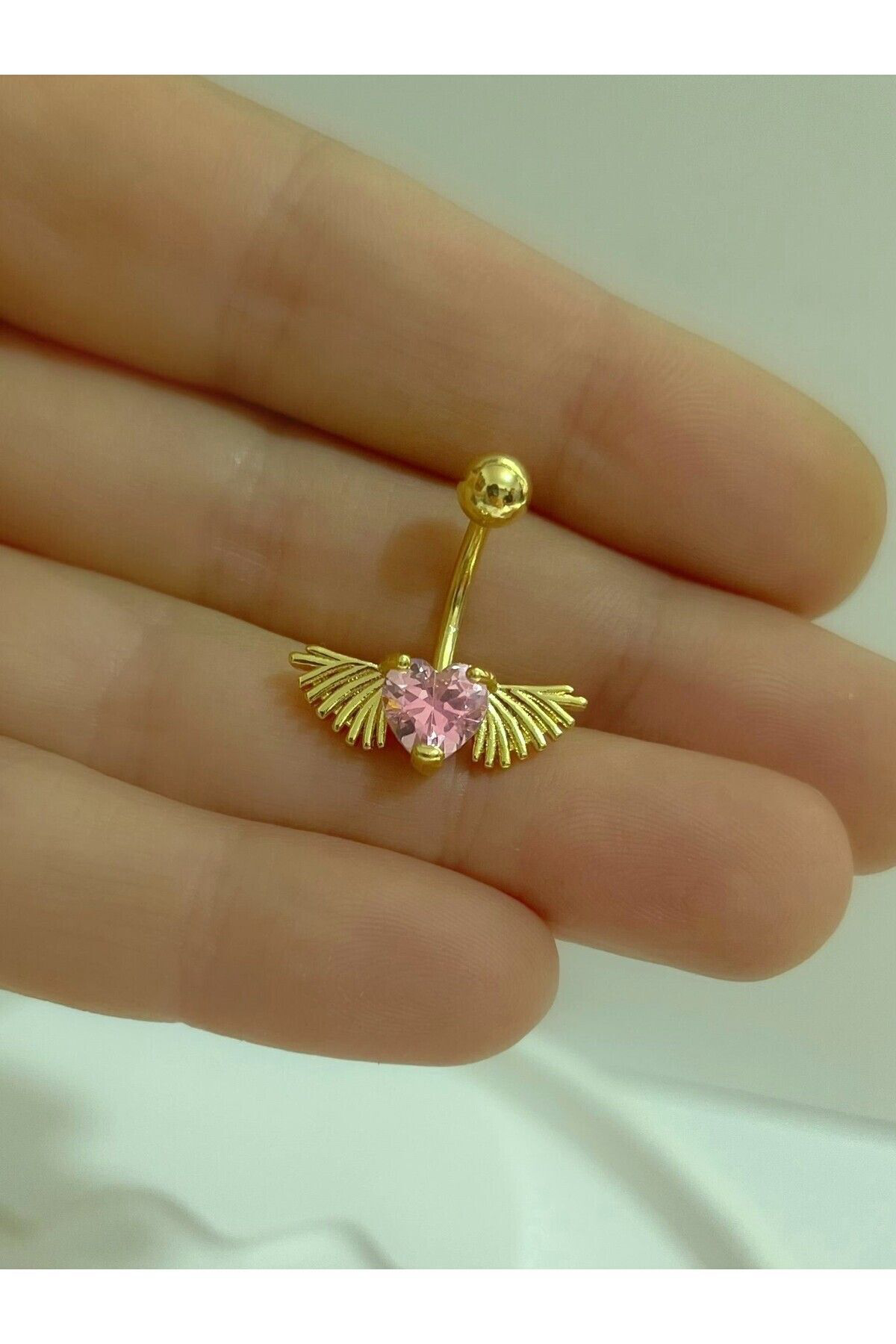 CERRAHİ ÇELİK PEMBE TAŞLI KALPLİ KANATLI GOLD RENK GÖBEK PİERCİNGİ Fiyatı, Yorumları ve Özellikleri