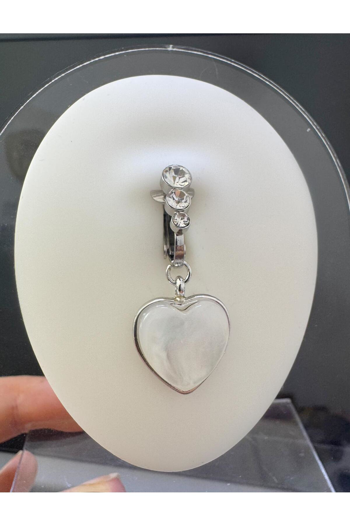 deliksiz fake sıkıştırma kalpli göbek piercingi