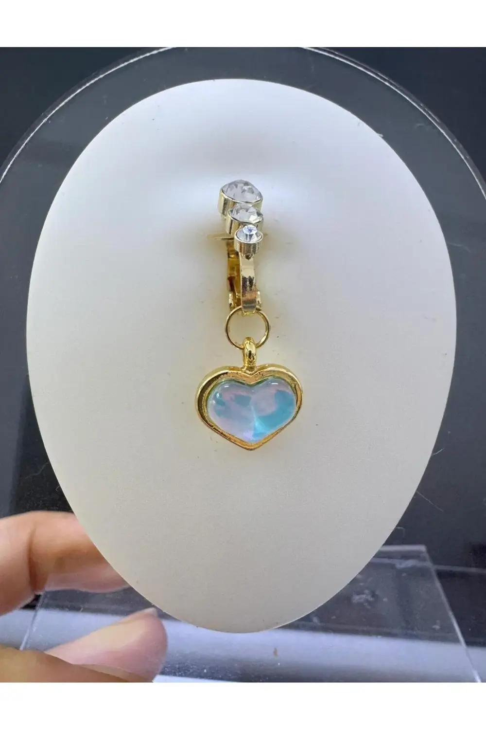 deliksiz fake sıkıştırma kalpli göbek piercingi