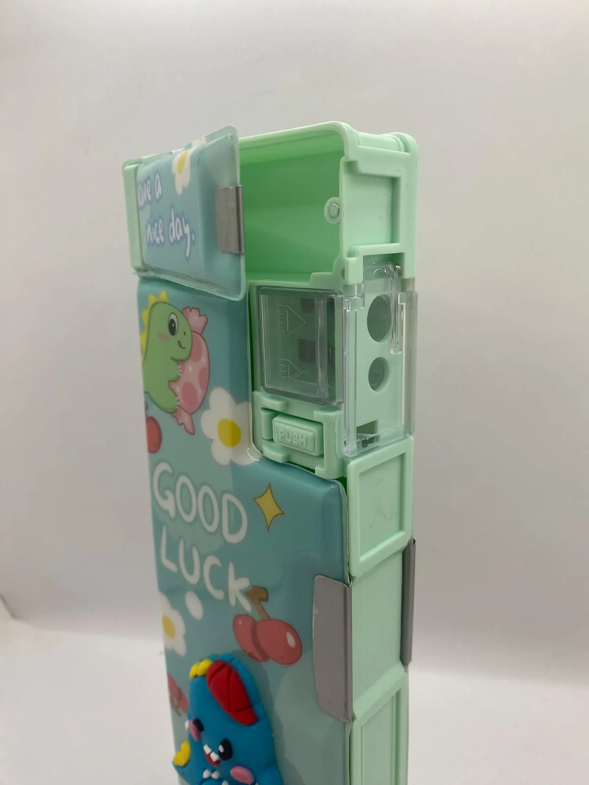 Fonksiyonlu Kalem Kutusu Dinozor Stres Çarklı Kalemtraşlı Kalemlik - Yeşil Good Luck Fonksiyonlu Kalem Kutusu Dinozor Stres Çarklı Kalemtraşlı Kalemlik - Yeşil Good Luck Fiyatı, Yorumları ve Özellikleri