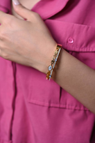 GOLD HAMUR ŞAMBALA ZİRKON TAŞ NAZAR BONCUĞU VE LALE DETAY KELEPÇE