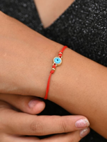 GOLD KAPLAMA CAM NAZAR BONCUK DETAY MAKROME ÖRME BİLEKLİK-BİLEKLİ