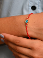 GOLD KAPLAMA CAM NAZAR BONCUK DETAY MAKROME ÖRME BİLEKLİK-BİLEKLİ