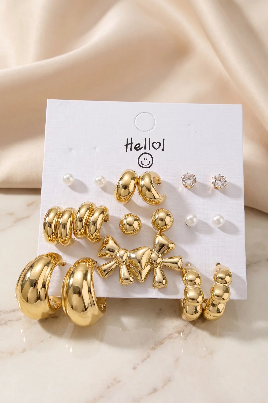 Gold Renk Metalik Kaplamalı Fiyonk Detaylı CCB 9 Çift Küpe Seti TJ-BKP12102 Gold Renk Metalik Kaplamalı Fiyonk Detaylı CCB 9 Çift Küpe Seti TJ-BKP12102