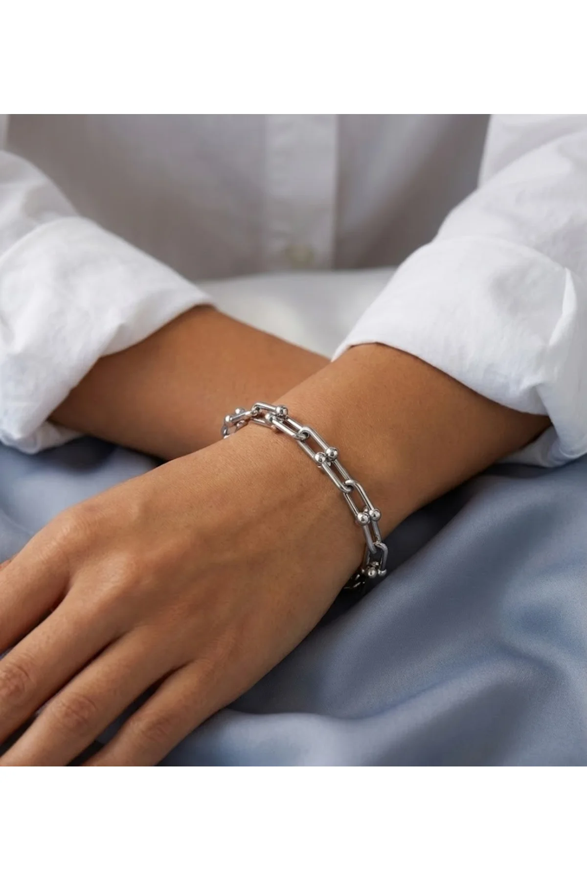 Gümüş Renkli Geçmeli Çelik Bileklik