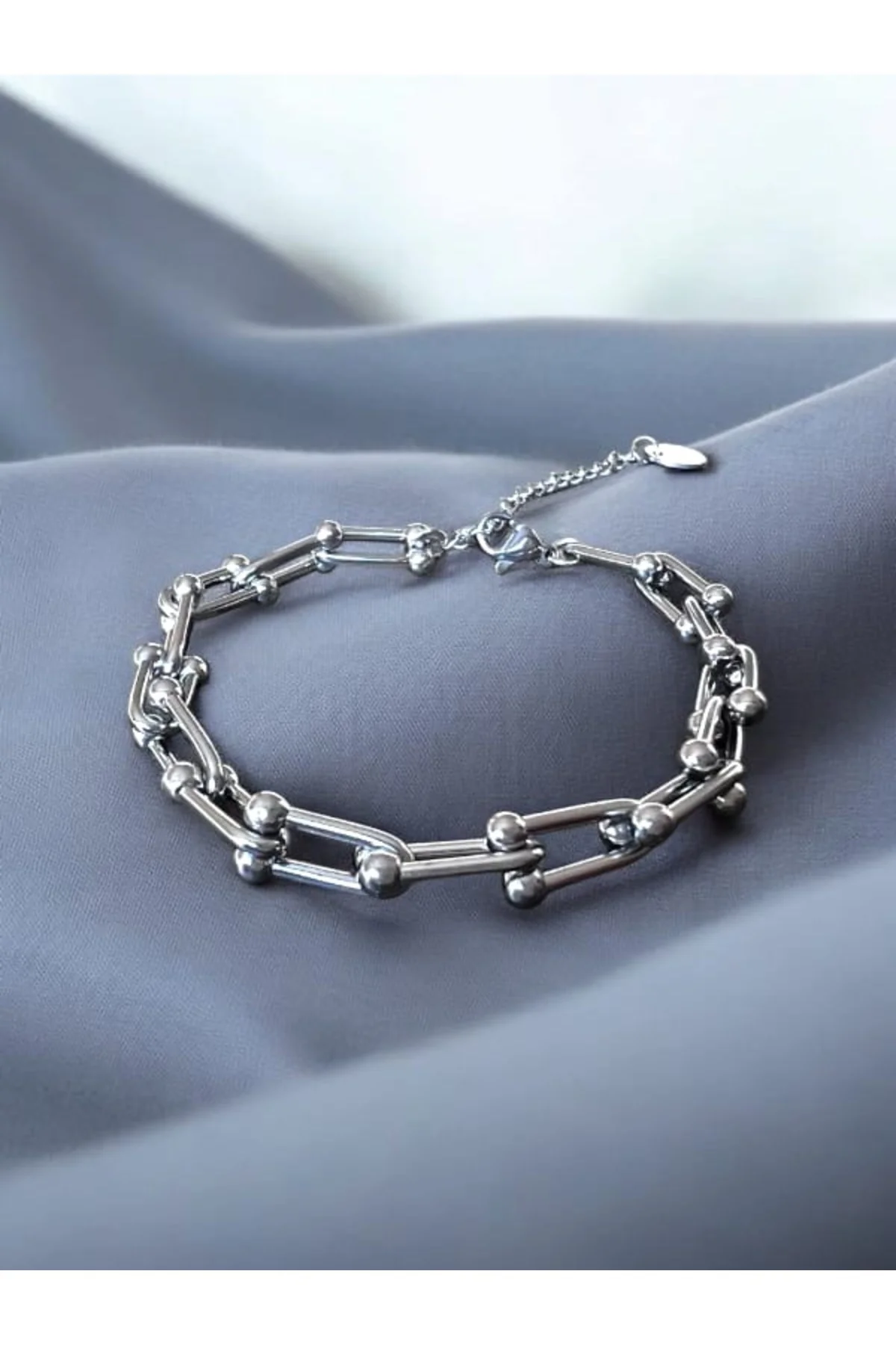 Gümüş Renkli Geçmeli Çelik Bileklik