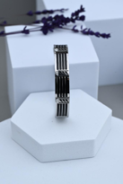 GÜMÜŞ SİYAH DETAY KELEPÇE ÇELİK BİLEKLİK-KEZTÇBİ56