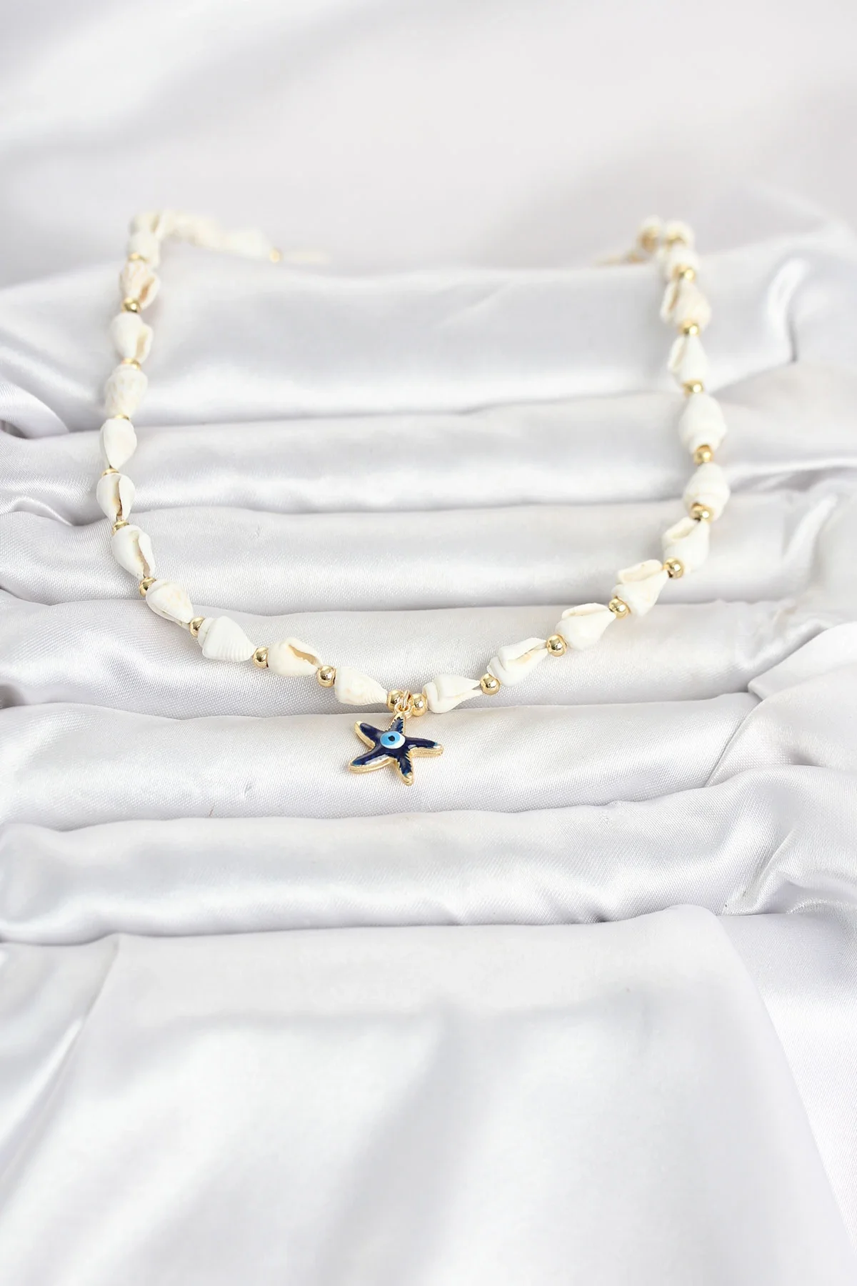 İthalat® Doğal Deniz Kabuğu Dizili Mavi Yıldız Göz Model Kolye