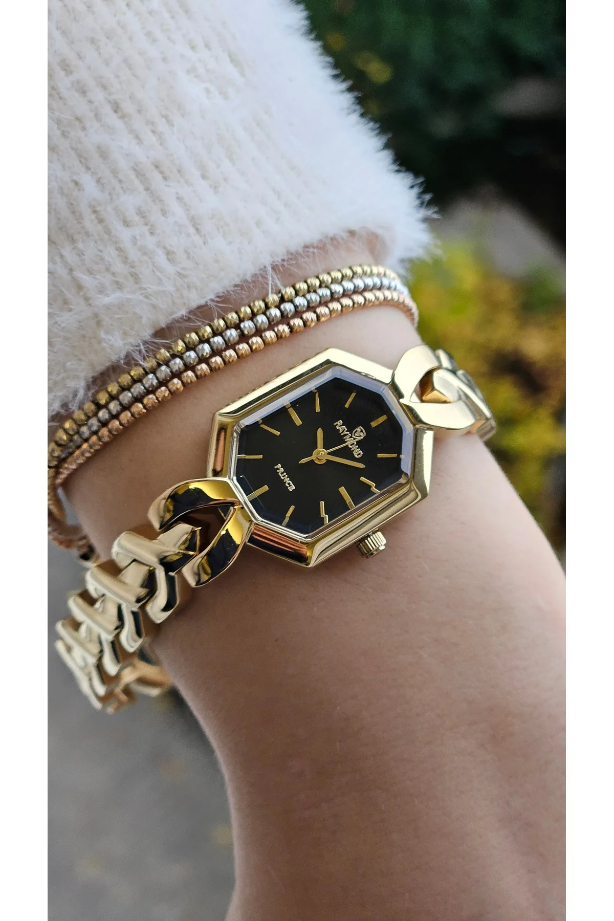 KADIN KOL SAATİ RYM-213057-GOLD-SİYAH KADIN KOL SAATİ RYM-213057-GOLD-SİYAH