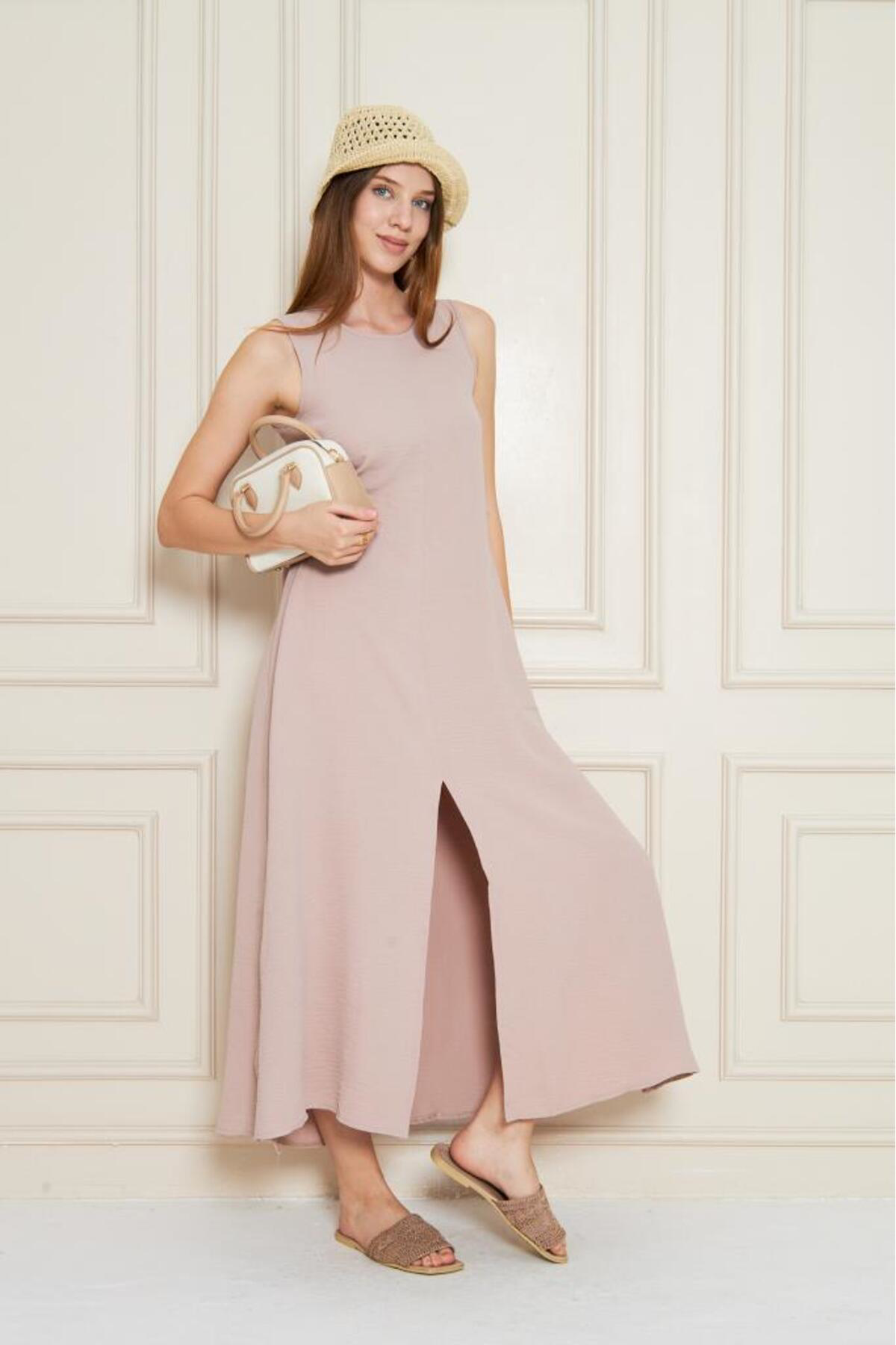 Pasaklı Giyim Kadın Pudra Sıfır Kol Aerobin Kumaş A Kesim Yırtmaçlı Maxi Yazlık Pasaklı Giyim Kadın Pudra Sıfır Kol Aerobin Kumaş A Kesim Yırtmaçlı Maxi Yazlık