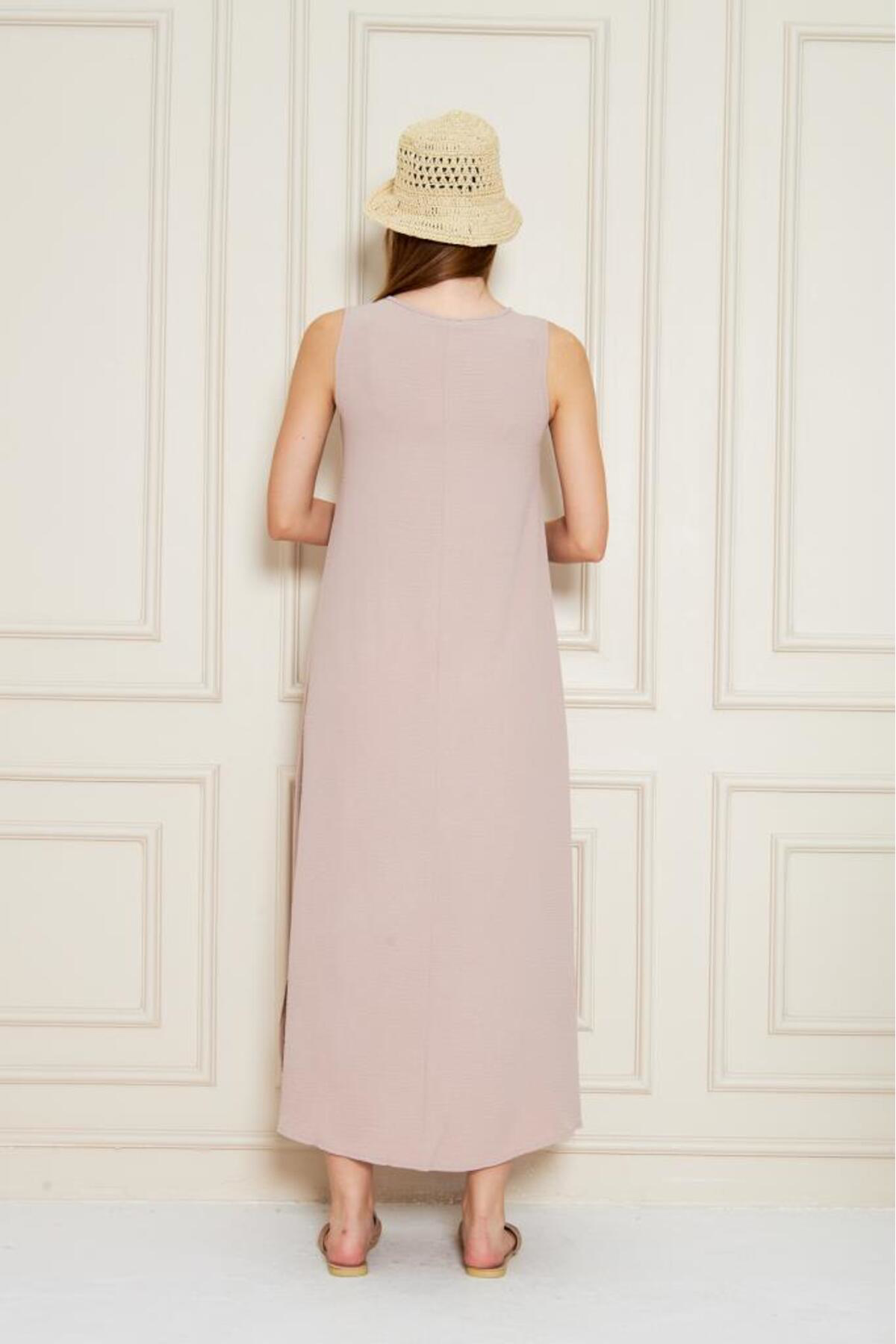 Pasaklı Giyim Kadın Pudra Sıfır Kol Aerobin Kumaş A Kesim Yırtmaçlı Maxi Yazlık Pasaklı Giyim Kadın Pudra Sıfır Kol Aerobin Kumaş A Kesim Yırtmaçlı Maxi Yazlık