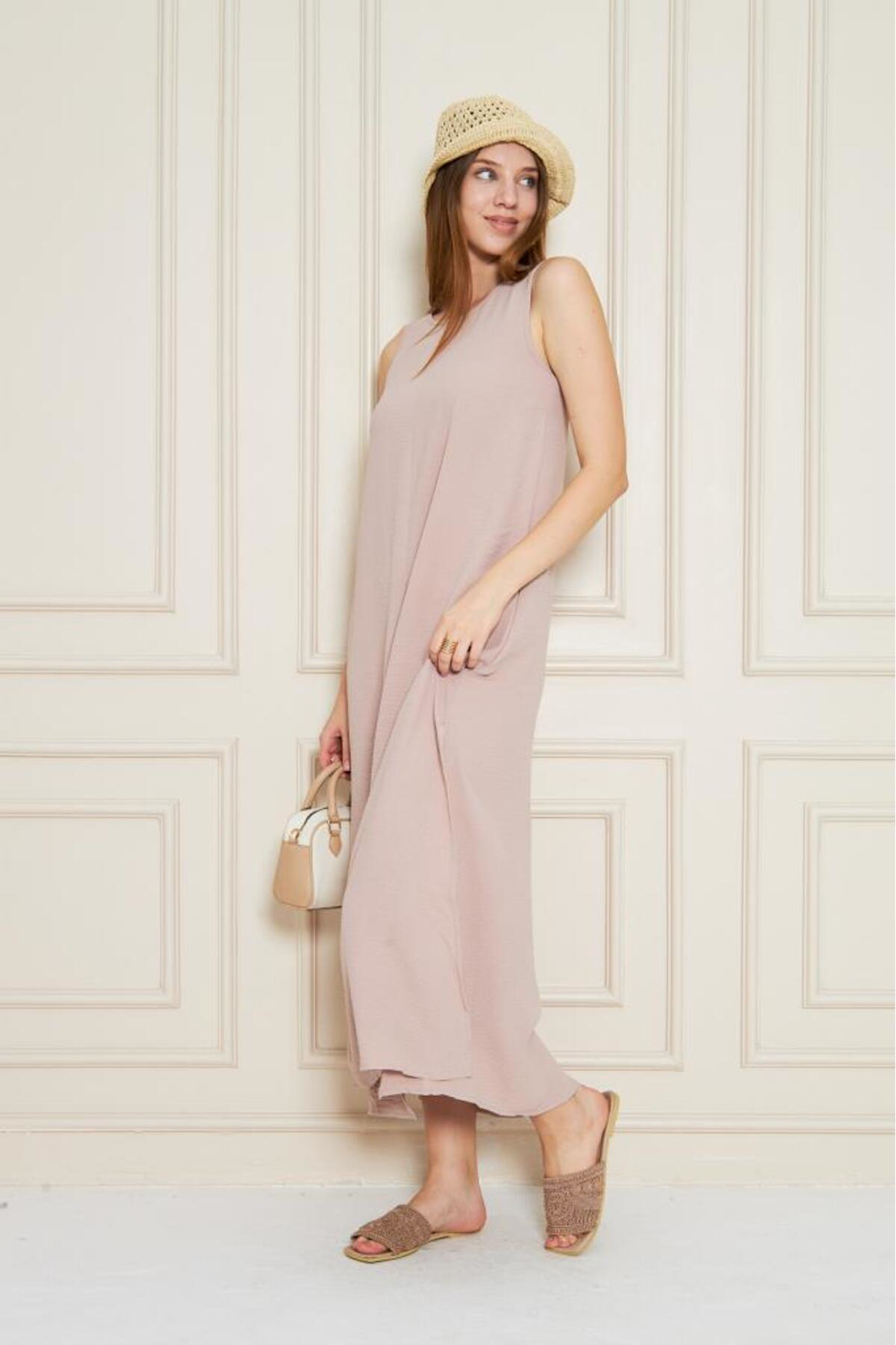 Pasaklı Giyim Kadın Pudra Sıfır Kol Aerobin Kumaş A Kesim Yırtmaçlı Maxi Yazlık Pasaklı Giyim Kadın Pudra Sıfır Kol Aerobin Kumaş A Kesim Yırtmaçlı Maxi Yazlık