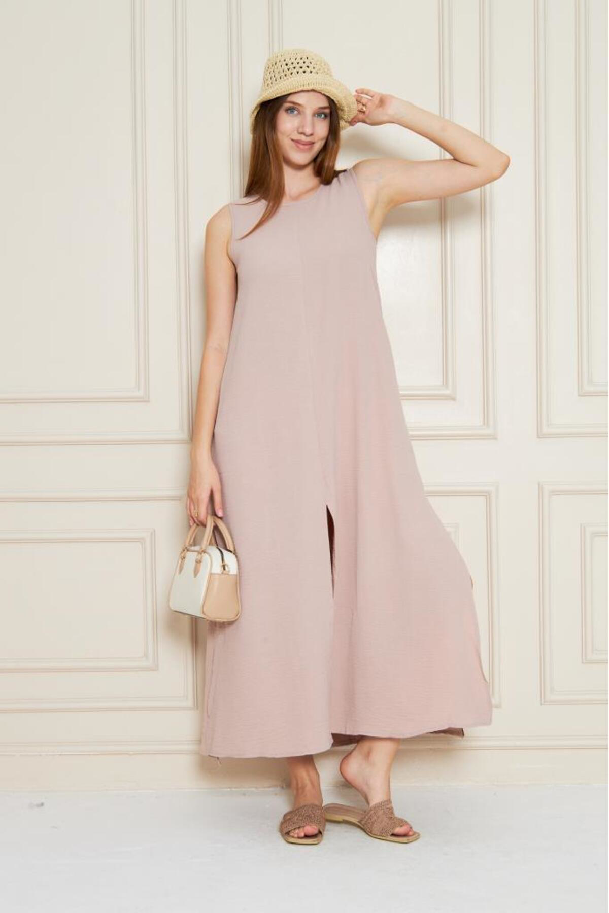 Pasaklı Giyim Kadın Pudra Sıfır Kol Aerobin Kumaş A Kesim Yırtmaçlı Maxi Yazlık Pasaklı Giyim Kadın Pudra Sıfır Kol Aerobin Kumaş A Kesim Yırtmaçlı Maxi Yazlık