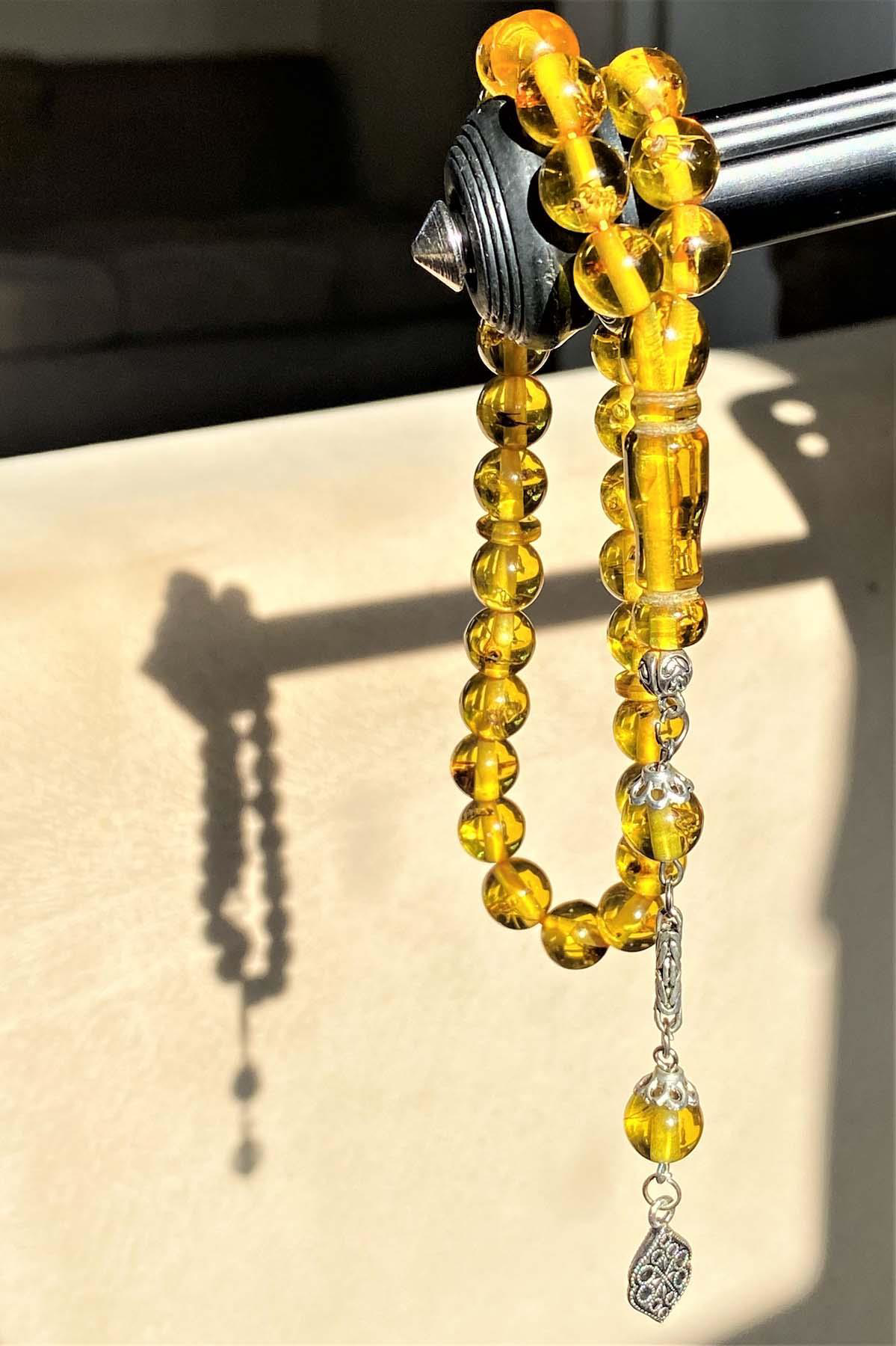 Beyisa Küre Kesim Karınca Fosilli Püsküllü Toz Kehribar Tesbi Beyisa Küre Kesim Karınca Fosilli Püsküllü Toz Kehribar Tesbi