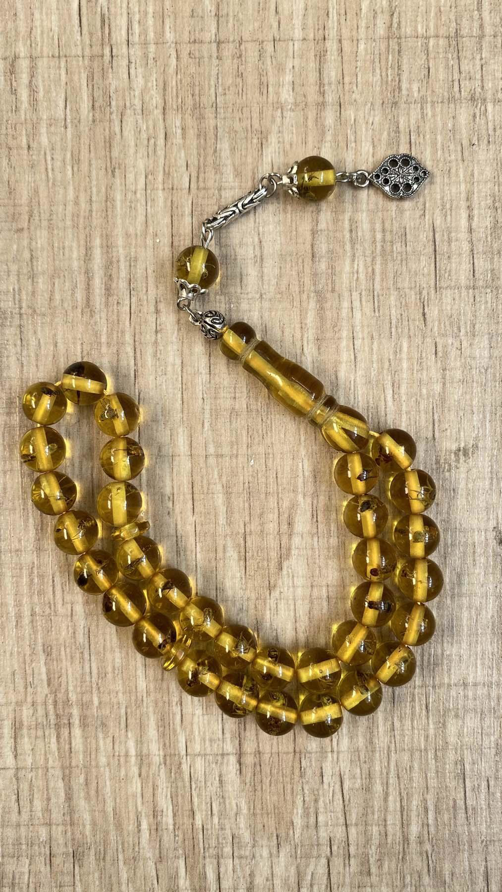 Beyisa Küre Kesim Karınca Fosilli Püsküllü Toz Kehribar Tesbi Beyisa Küre Kesim Karınca Fosilli Püsküllü Toz Kehribar Tesbi