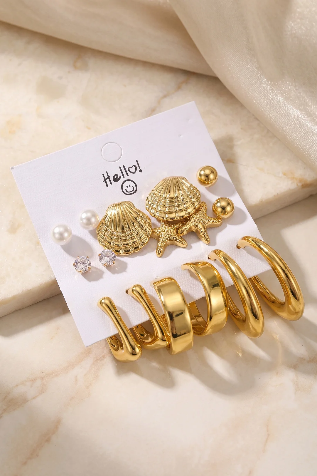Metalik Kaplama Gold Renk Deniz Kabuğu Detaylı CCB 9 Çift Kadın Küpe Seti TJ-BKP12100 Metalik Kaplama Gold Renk Deniz Kabuğu Detaylı CCB 9 Çift Kadın Küpe Seti TJ-BKP12100