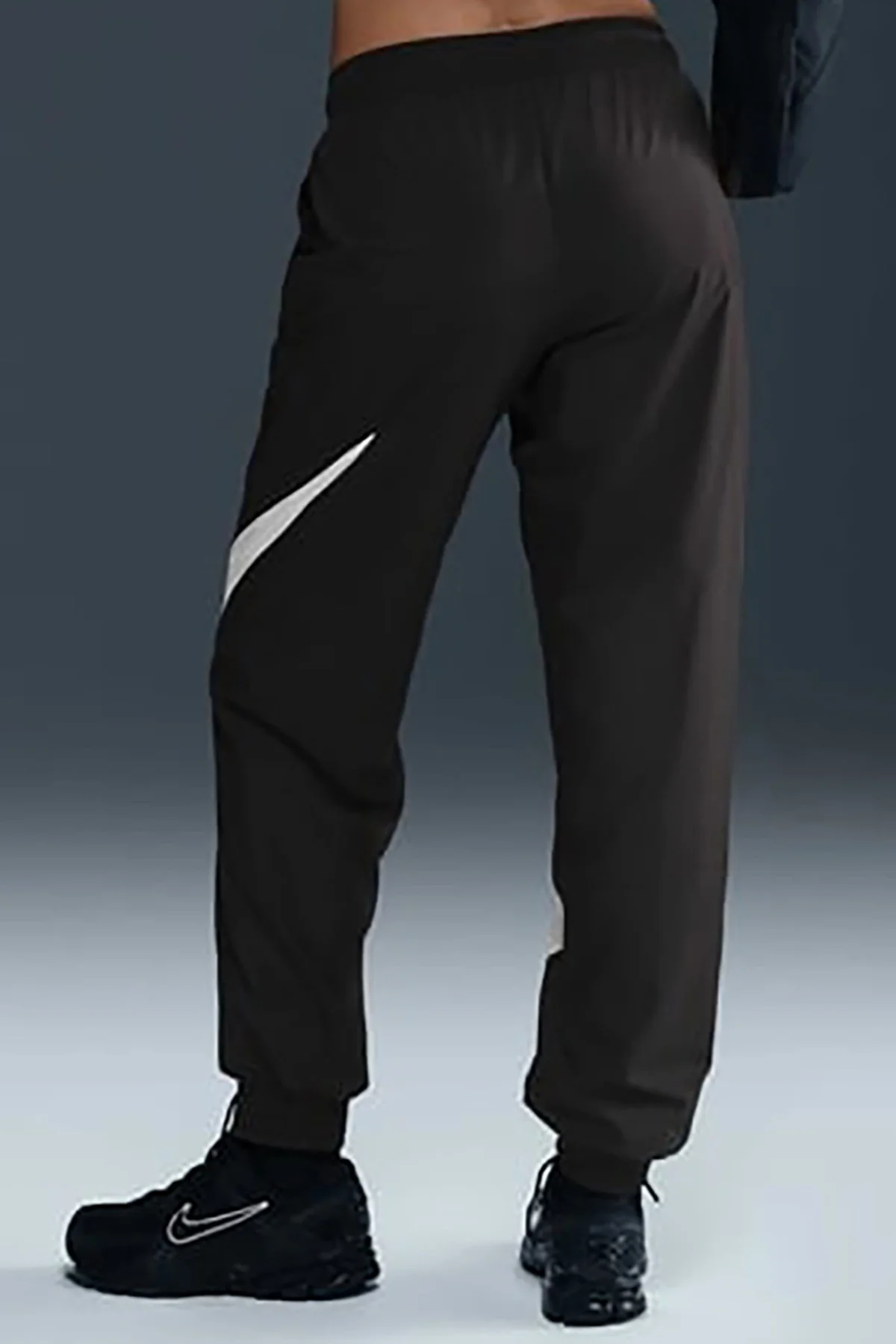 Nike Classic Woven MR UV Logo Womens Jogger Pant Lastik Paçalı Astarlı Kadın Günlük Eşofman Altı Siyah Nike Classic Woven MR UV Logo Womens Jogger Pant Lastik Paçalı Astarlı Kadın Günlük Eşofman Altı Siyah Fiyatı, Yorumları ve Özellikleri