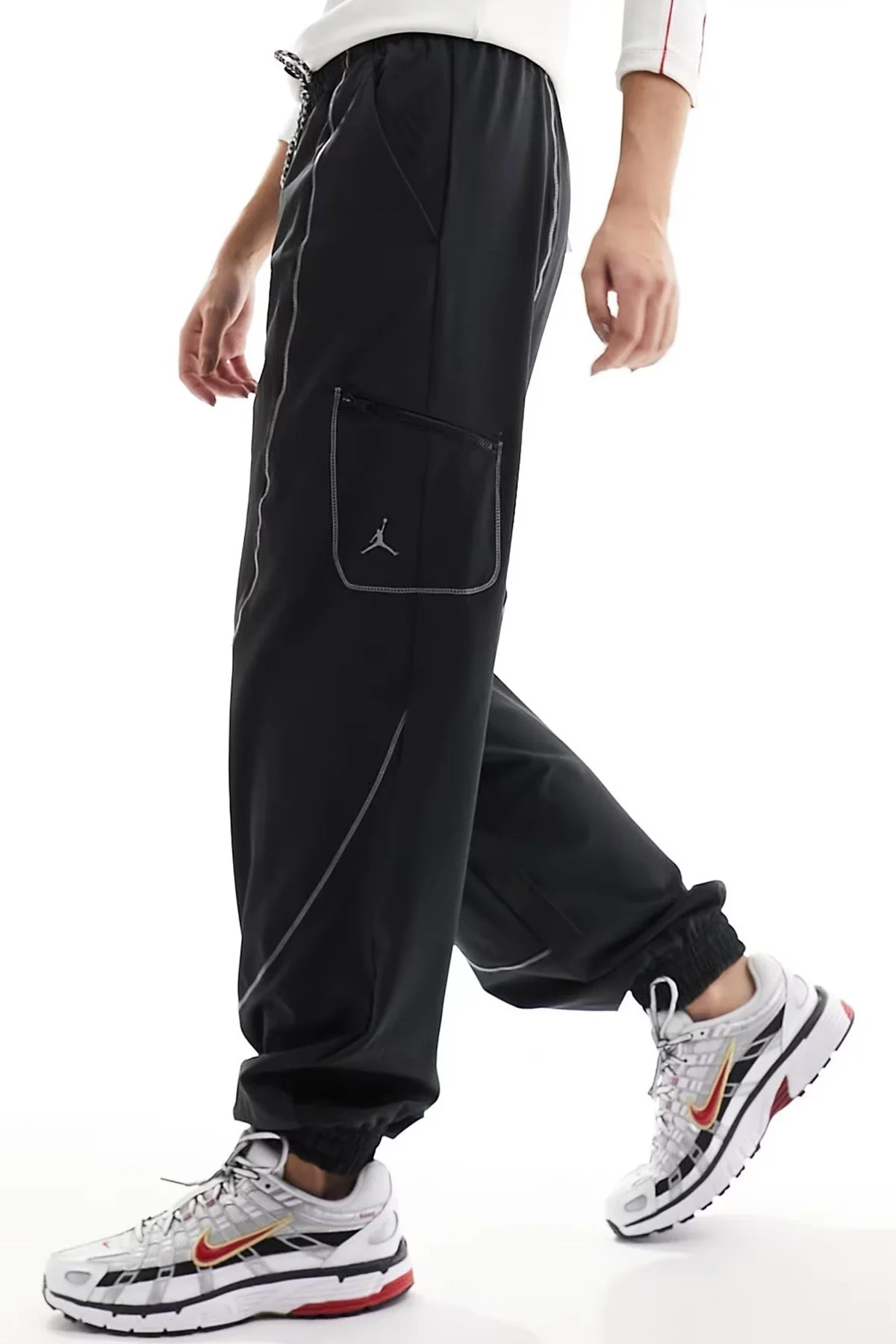 Nike Jordan Sport Tunnel Four Way Stretch Kadın Loose Fit Bol Kesim Eşofman Altı Siyah Nike Jordan Sport Tunnel Four Way Stretch Kadın Loose Fit Bol Kesim Eşofman Altı Siyah