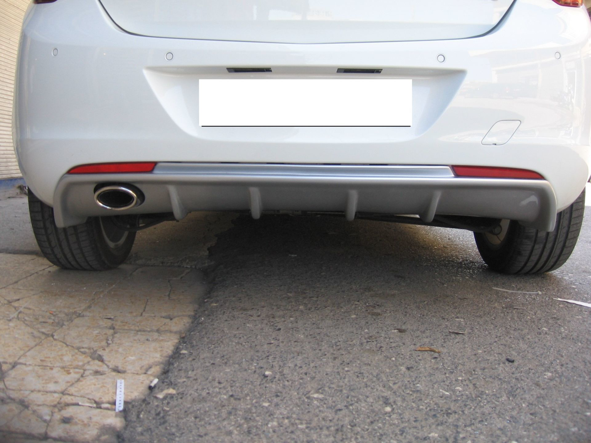 Opel Astra Uyumlu J Hatchback Arka Tampon Eki Difüzör Boyalı (Düz Opel Astra Uyumlu J Hatchback Arka Tampon Eki Difüzör Boyalı (Düz
