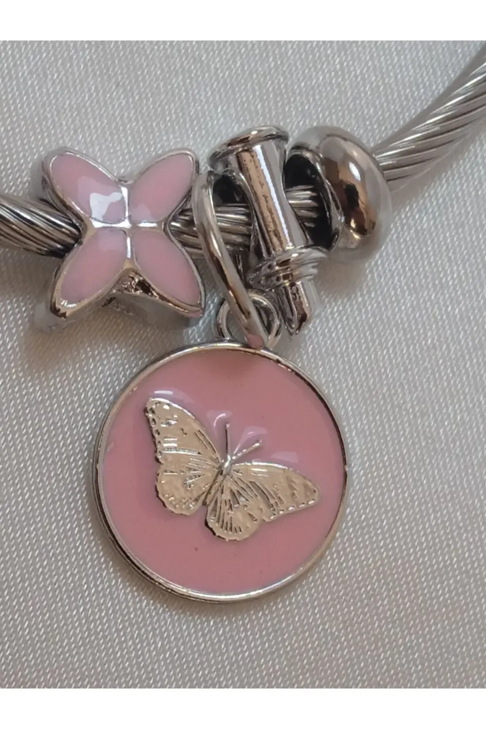 Pembe kelebek çelik charm bileklik