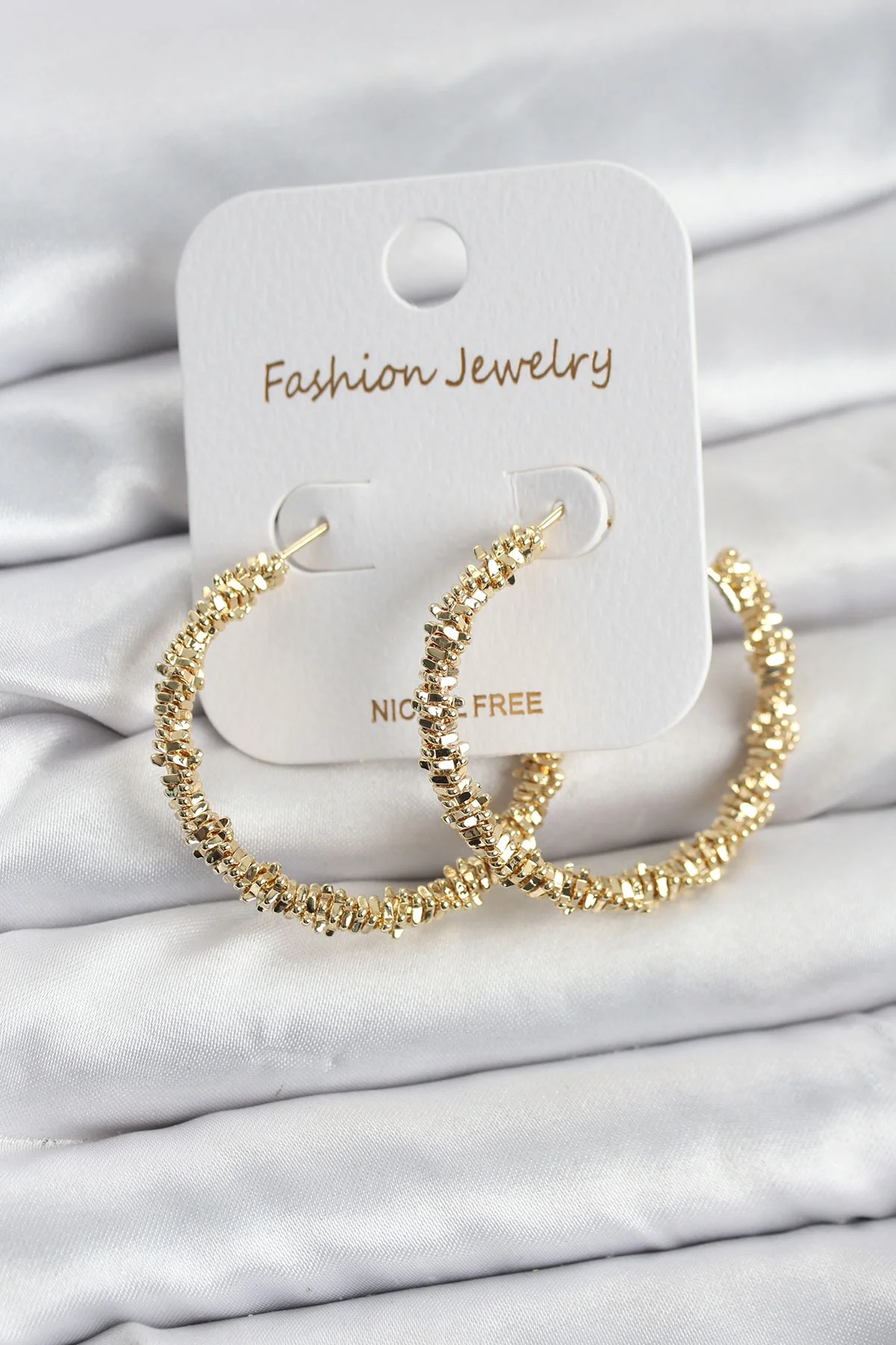 Pirinç Gold Renk Tırtıklı Halka Model Kadın Küpe