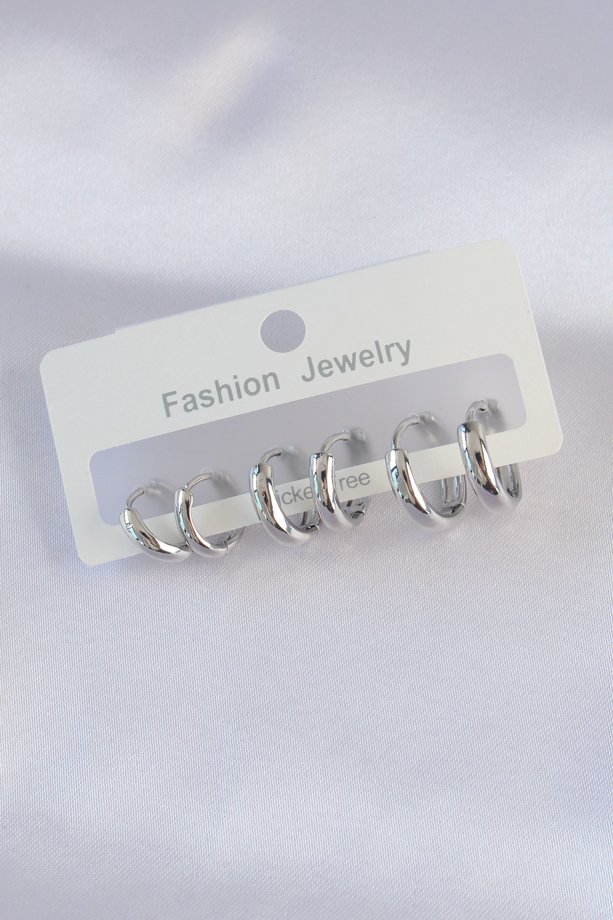 Stillove Pirinç Gümüş Renk Oval Bombeli Küpe Seti Sl7812