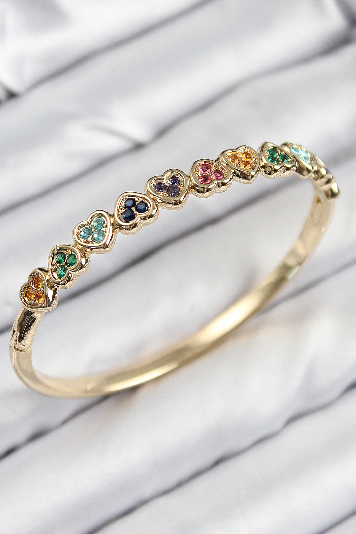 Pirinç Renkli Zirkon Taşlı Sıralı Kalp Model Gold Renk Kadın Kele