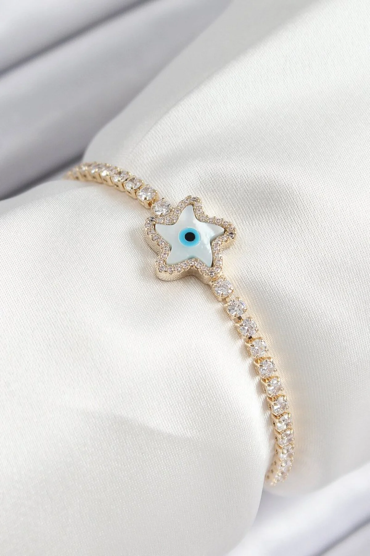 Pirinç Zirkon Taşlı Nazar Yıldız Model Gold Renk Asansörlü Kadın Bileklik Pirinç Zirkon Taşlı Nazar Yıldız Model Gold Renk Asansörlü Kadın Bileklik