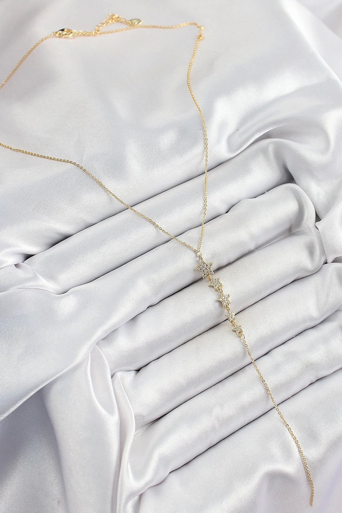 Butik Pirinç Zirkon Taşlı Sıralı Yıldız Figürlü Y Model Gold Renk Kadın