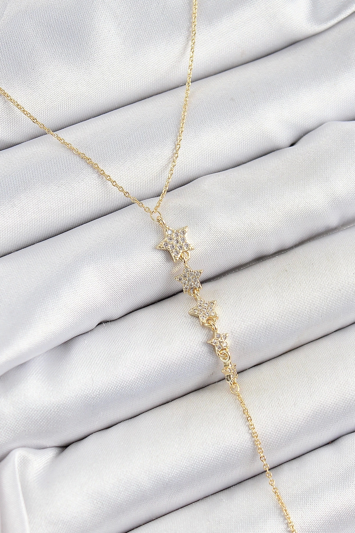 Butik Pirinç Zirkon Taşlı Sıralı Yıldız Figürlü Y Model Gold Renk Kadın