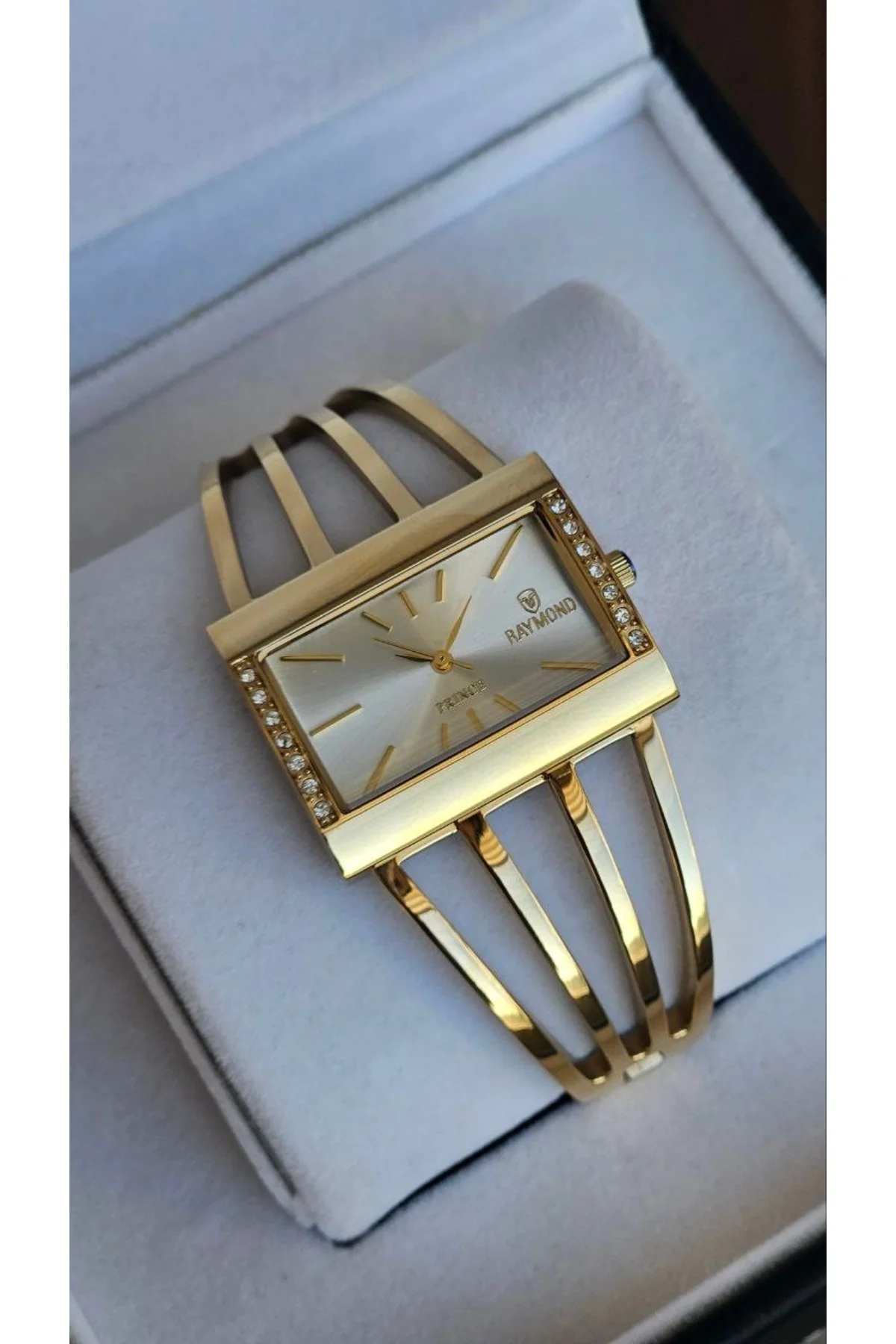RYM-1142 QUARTZ KABURGA MODELİ KADIN KOL SAATİ - 2 YIL GARANTİ GOLD-BEYAZ