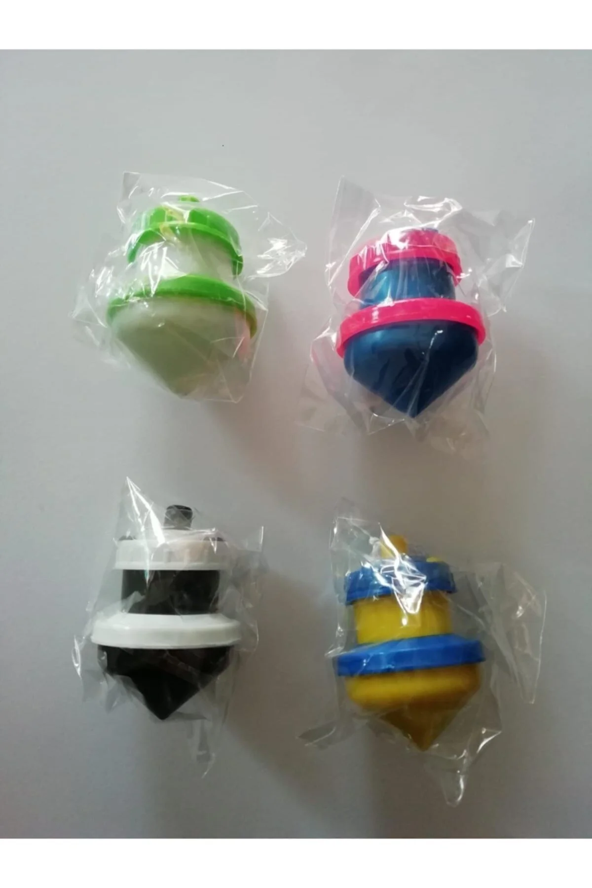 Sert Plastik Çocukların Sevdiği Renkli Basmalı Dönen Topaç (4'lü 